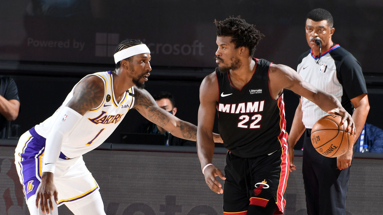 ORLANDO, FL - OCTOBER 4: Kentavious Caldwell-Pope #1 of the Los Angeles Lakers plays defense against Jimmy Butler #22 of the Miami Heat during Game Three of the NBA Finals on October 4, 2020 at The AdventHealth Arena at ESPN Wide World Of Sports Complex in Orlando, Florida. NOTE TO USER: User expressly acknowledges and agrees that, by downloading and/or using this Photograph, user is consenting to the terms and conditions of the Getty Images License Agreement. Mandatory Copyright Notice: Copyright 2020 NBAE