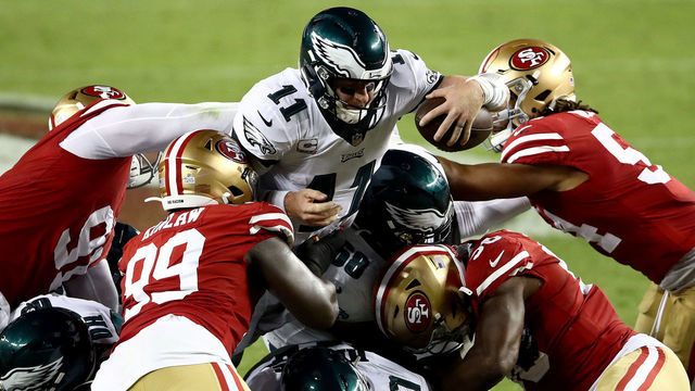 SANTA CLARA, CALIFORNIA - OCTOBER 04: Carson Wentz #11 of the Philadelphia Eagles runs the keeper against the San Francisco 49ers in the third quarter of the game at Levi's Stadium on October 04, 2020 in Santa Clara, California.
