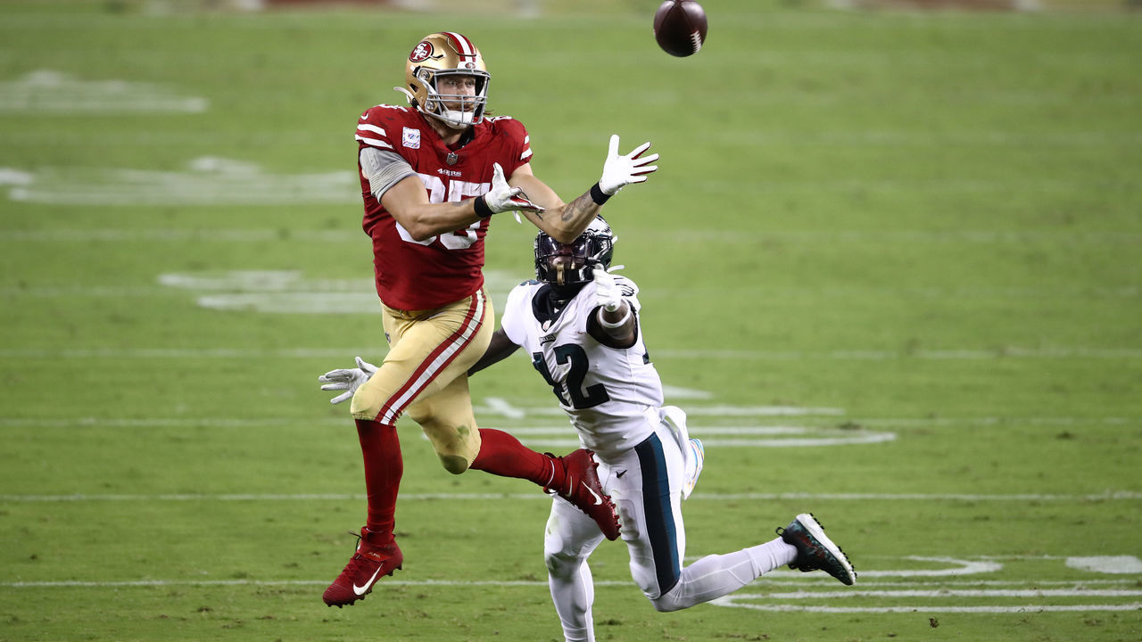 SANTA CLARA, CALIFORNIA - OCTOBER 04: George Kittle #85 of the San Francisco 49ers makes a catch against K'Von Wallace #42 of the Philadelphia Eagles in the third quarter of the game at Levi's Stadium on October 04, 2020 in Santa Clara, California.