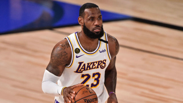 ORLANDO, FL - OCTOBER 04: LeBron James #23 of the Los Angeles Lakers dribbles the ball against the Miami Heat uring Game Three of the NBA Finals on October 4, 2020 in Orlando, Florida at AdventHealth Arena. NOTE TO USER: User expressly acknowledges and agrees that, by downloading and/or using this Photograph, user is consenting to the terms and conditions of the Getty Images License Agreement. Mandatory Copyright Notice: Copyright 2020 NBAE