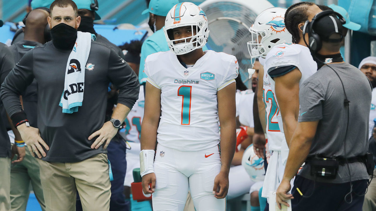MIAMI GARDENS, FLORIDA - SEPTEMBER 20: Tua Tagovailoa #1 of the Miami Dolphins looks on from the sideline against the Buffalo Bills during the third quarter at Hard Rock Stadium on September 20, 2020 in Miami Gardens, Florida.