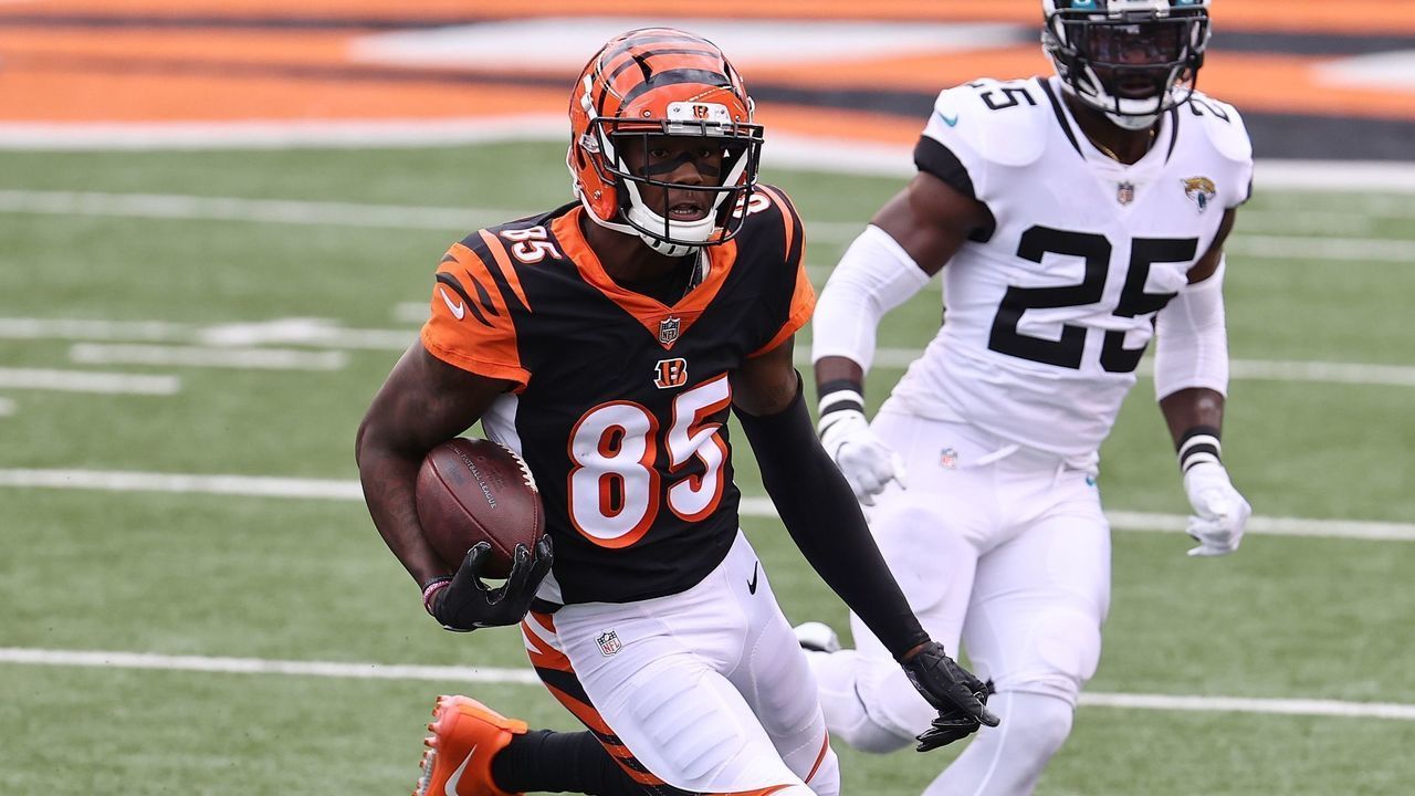 CINCINNATI, OHIO - OCTOBER 04: Tee Higgins #85 of the Cincinnati Bengals runs with the ball during the 33-25 win against Jacksonville Jaguars at Paul Brown Stadium on October 04, 2020 in Cincinnati, Ohio.