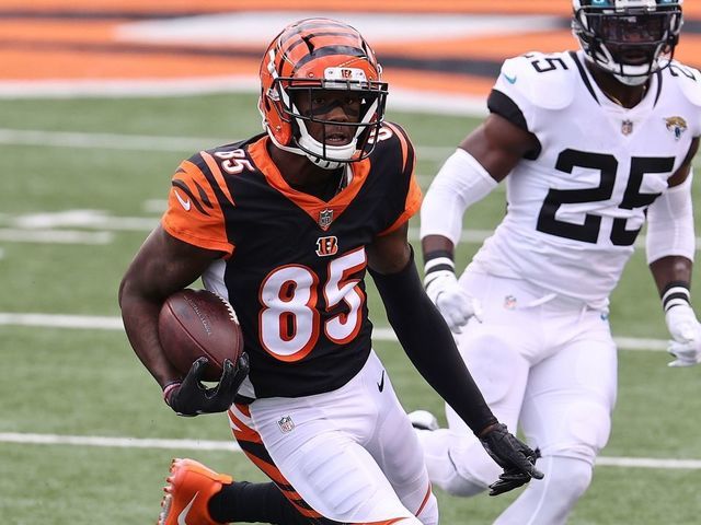CINCINNATI, OHIO - OCTOBER 04: Tee Higgins #85 of the Cincinnati Bengals runs with the ball during the 33-25 win against Jacksonville Jaguars at Paul Brown Stadium on October 04, 2020 in Cincinnati, Ohio.