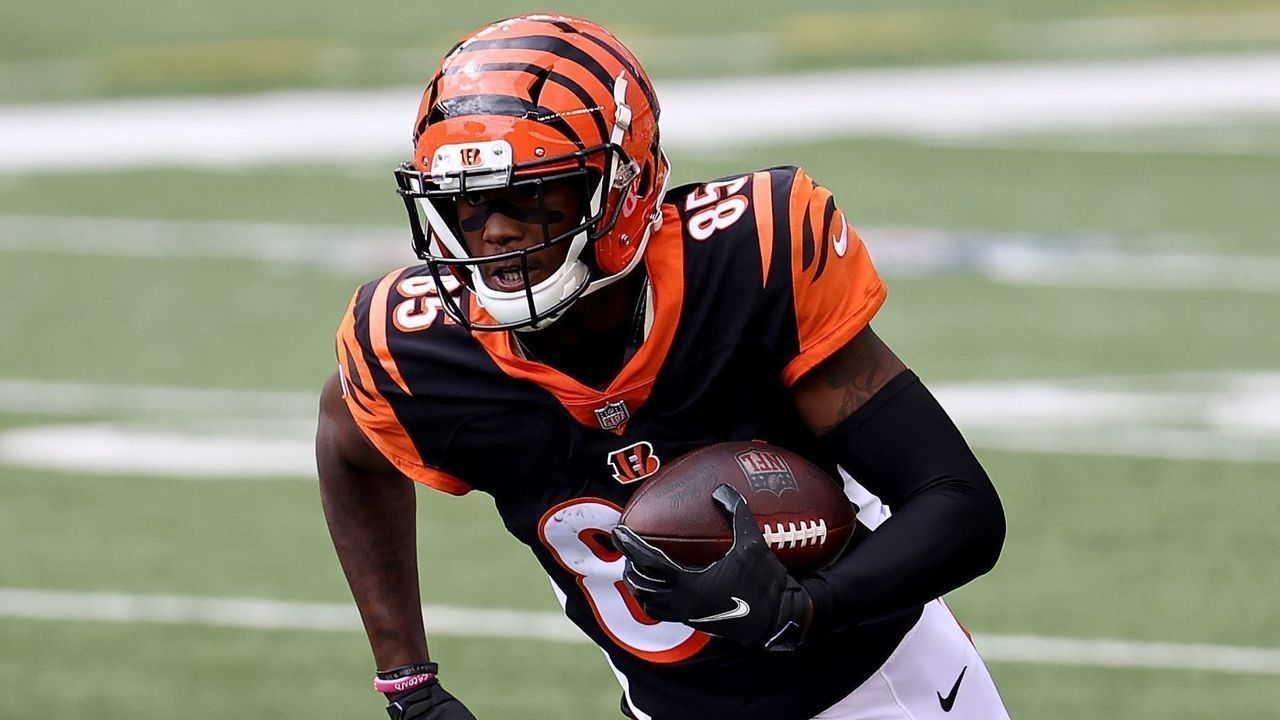 CINCINNATI, OHIO - OCTOBER 04: Tee Higgins #85 of the Cincinnati Bengals runs with the ball during the 33-25 win against Jacksonville Jaguars at Paul Brown Stadium on October 04, 2020 in Cincinnati, Ohio.