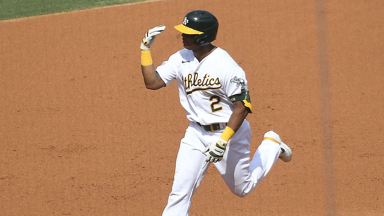 LOS ANGELES, CALIFORNIA - OCTOBER 05: Khris Davis #2 of the Oakland Athletics rounds the bases after hitting a two run home run against the Houston Astros during the second inning in Game One of the American League Division Series at Dodger Stadium on October 05, 2020 in Los Angeles, California.