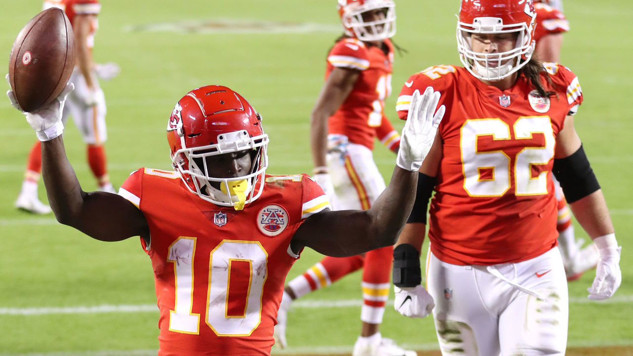 KANSAS CITY, MISSOURI - OCTOBER 05: Tyreek Hill #10 of the Kansas City Chiefs celebrates after scoring a touchdown against the New England Patriots during the second half at Arrowhead Stadium on October 05, 2020 in Kansas City, Missouri.
