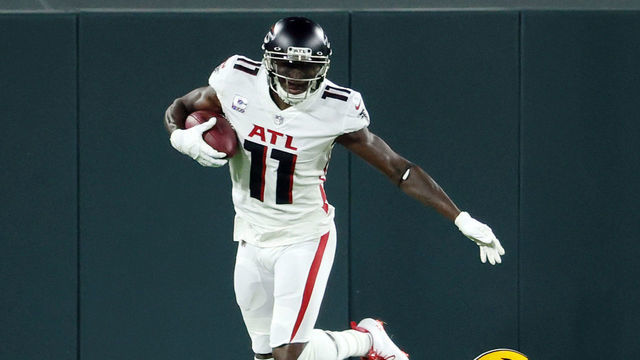 GREEN BAY, WISCONSIN - OCTOBER 05: Kevin King #20 of the Green Bay Packers attempts to tackle Julio Jones #11 of the Atlanta Falcons during the first half at Lambeau Field on October 05, 2020 in Green Bay, Wisconsin.