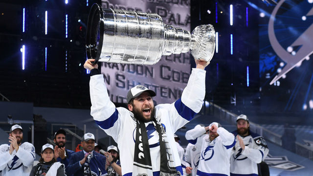 EDMONTON, ALBERTA - SEPTEMBER 28: Tyler Johnson #9 of the Tampa Bay Lightning hoists the Stanley Cup overhead after the Tampa Bay Lightning defeated the Dallas Stars 2-0 in Game Six of the NHL Stanley Cup Final to win the best of seven game series 4-2 at Rogers Place on September 28, 2020 in Edmonton, Alberta, Canada.