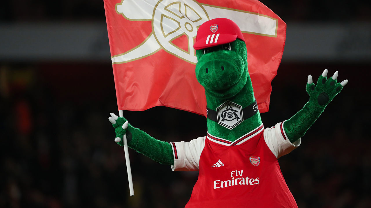 LONDON, ENGLAND - DECEMBER 05: Gunnersaurus the mascot of Arsenal during the Premier League match between Arsenal FC and Brighton & Hove Albion at Emirates Stadium on December 5, 2019 in London, United Kingdom.