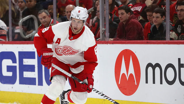 CHICAGO, ILLINOIS - JANUARY 05: Justin Abdelkader #8 of the Detroit Red Wings looks to pass against the Chicago Blackhawks at the United Center on January 05, 2020 in Chicago, Illinois.