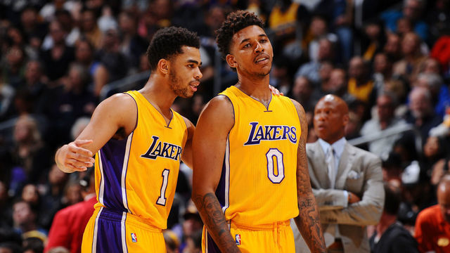 LOS ANGELES, CA - FEBRUARY 19: D'Angelo Russell #1 of the Los Angeles Lakers and Nick Young #0 of the Los Angeles Lakers talk during the game against the San Antonio Spurs on February 19, 2016 at STAPLES Center in Los Angeles, California. NOTE TO USER: User expressly acknowledges and agrees that, by downloading and/or using this Photograph, user is consenting to the terms and conditions of the Getty Images License Agreement. Mandatory Copyright Notice: Copyright 2016 NBAE