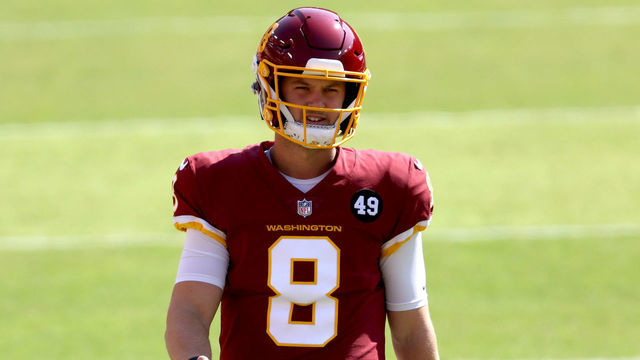 LANDOVER, MARYLAND - OCTOBER 04: Quarterback Kyle Allen #8 of the Washington Football Team warms up against the Baltimore Ravens at FedExField on October 04, 2020 in Landover, Maryland.