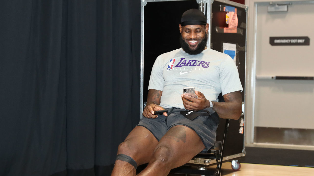 ORLANDO, FL - OCTOBER 6: LeBron James #23 of the Los Angeles Lakers talks on FaceTime after Game Four of the NBA Finals on October 6, 2020 at AdventHealth Arena in Orlando, Florida. NOTE TO USER: User expressly acknowledges and agrees that, by downloading and/or using this Photograph, user is consenting to the terms and conditions of the Getty Images License Agreement. Mandatory Copyright Notice: Copyright 2020 NBAE