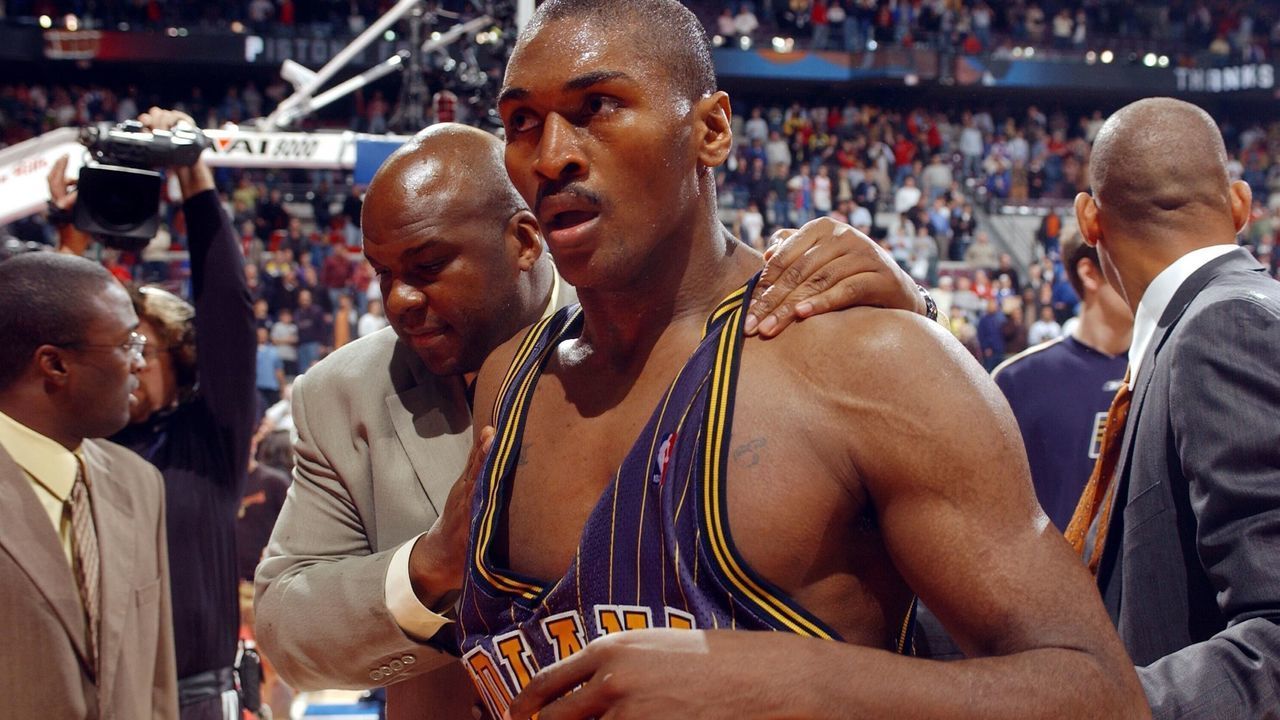 AUBURN HILLS, MI - NOVEMBER 19: Ron Artest of the Indiana Pacers #91 leaves the floor after a melee involving fans during a game against the Detroit Pistons November 19, 2004 at the Palace of Auburn Hills, in Auburn Hills, Michigan. NOTE TO USER: User expressly acknowledges and agrees that, by downloading and/or using this Photograph, User is consenting to the terms and conditions of the Getty Images License Agreement. Copyright 2004 NBAE