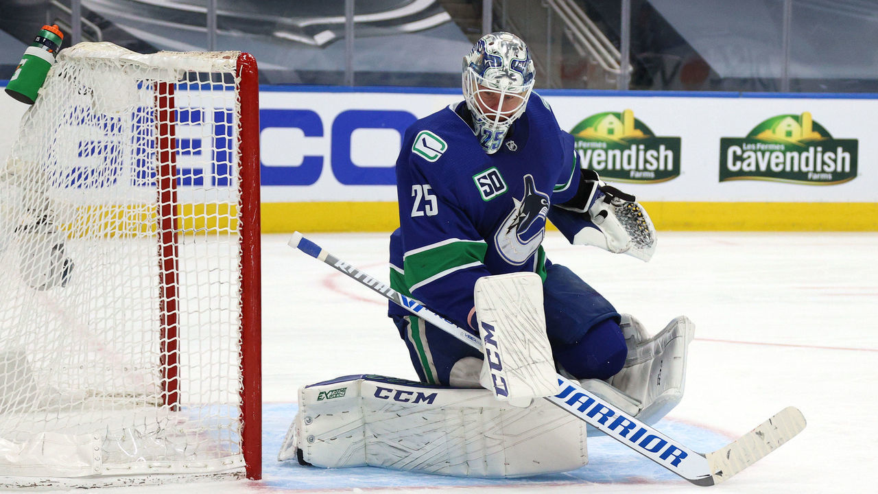 EDMONTON, ALBERTA - AUGUST 30: Goaltender Jacob Markstrom #25 of the Vancouver Canucks makes a save in the second period of Game Four of the Western Conference Second Round of the 2020 NHL Stanley Cup Playoff between the Vegas Golden Knights and the Vancouver Canucks at Rogers Place on August 30, 2020 in Edmonton, Alberta.