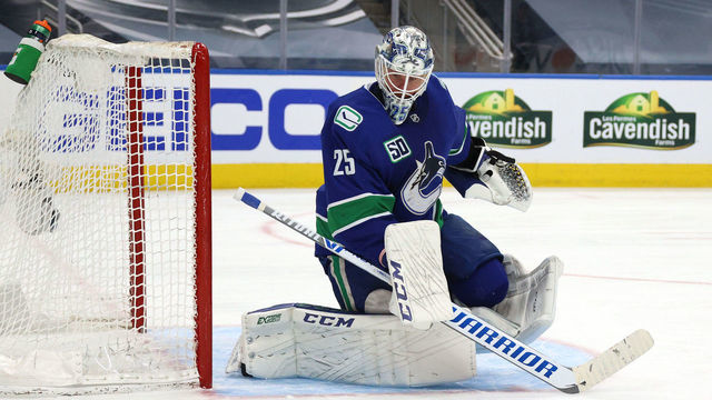 EDMONTON, ALBERTA - AUGUST 30: Goaltender Jacob Markstrom #25 of the Vancouver Canucks makes a save in the second period of Game Four of the Western Conference Second Round of the 2020 NHL Stanley Cup Playoff between the Vegas Golden Knights and the Vancouver Canucks at Rogers Place on August 30, 2020 in Edmonton, Alberta.