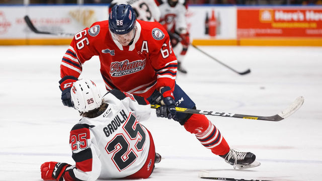 OSHAWA, ON - MARCH 1: Nico Gross #66 of the Oshawa Generals checks Daylon Groulx #25 of the Ottawa 67's during an OHL game at the Tribute Communities Centre on March 1, 2020 in Oshawa, Ontario, Canada.