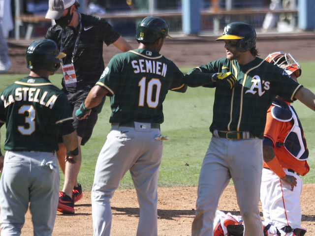 MLB playoffs: Athletics rally to beat Astros, stay alive in ALDS