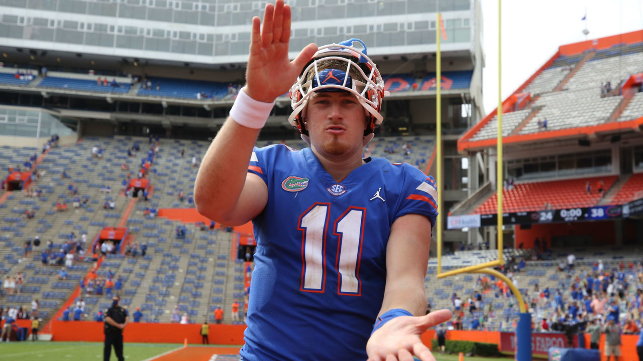 GAINESVILLE, FL - OCTOBER 3: Kyle Trask #11 of the Florida Gators does the Gator Chomp in the enzone after defeating the South Carolina Gamecocks on October 3, 2020 at Ben Hill Griffin Stadium in Gainesville, Florida.