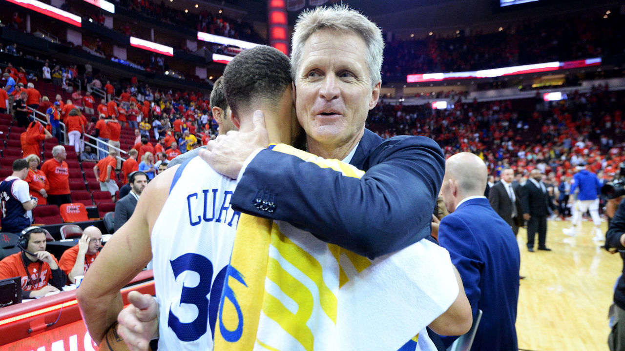 HOUSTON, TX - MAY 28: Stephen Curry #30 and Head Coach Steve Kerr of the Golden State Warriors hug after Game Seven of the Western Conference Finals against the Houston Rockets during the 2018 NBA Playoffs on May 28, 2018 at the Toyota Center in Houston, Texas. NOTE TO USER: User expressly acknowledges and agrees that, by downloading and/or using this photograph, user is consenting to the terms and conditions of the Getty Images License Agreement. Mandatory Copyright Notice: Copyright 2018 NBAE