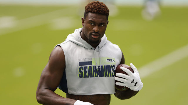 MIAMI GARDENS, FLORIDA - OCTOBER 04: DK Metcalf #14 of the Seattle Seahawks warms up prior to the game against the Miami Dolphins at Hard Rock Stadium on October 04, 2020 in Miami Gardens, Florida.