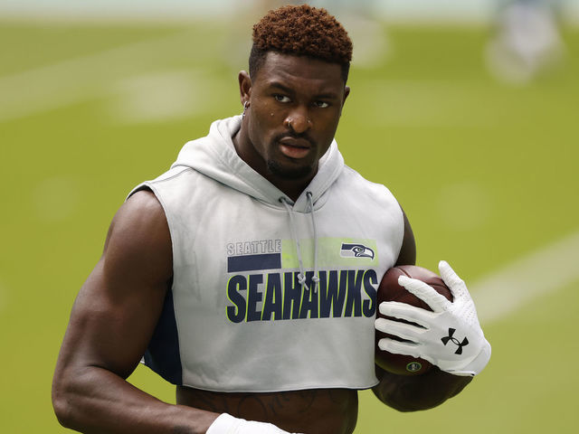 MIAMI GARDENS, FLORIDA - OCTOBER 04: DK Metcalf #14 of the Seattle Seahawks warms up prior to the game against the Miami Dolphins at Hard Rock Stadium on October 04, 2020 in Miami Gardens, Florida.
