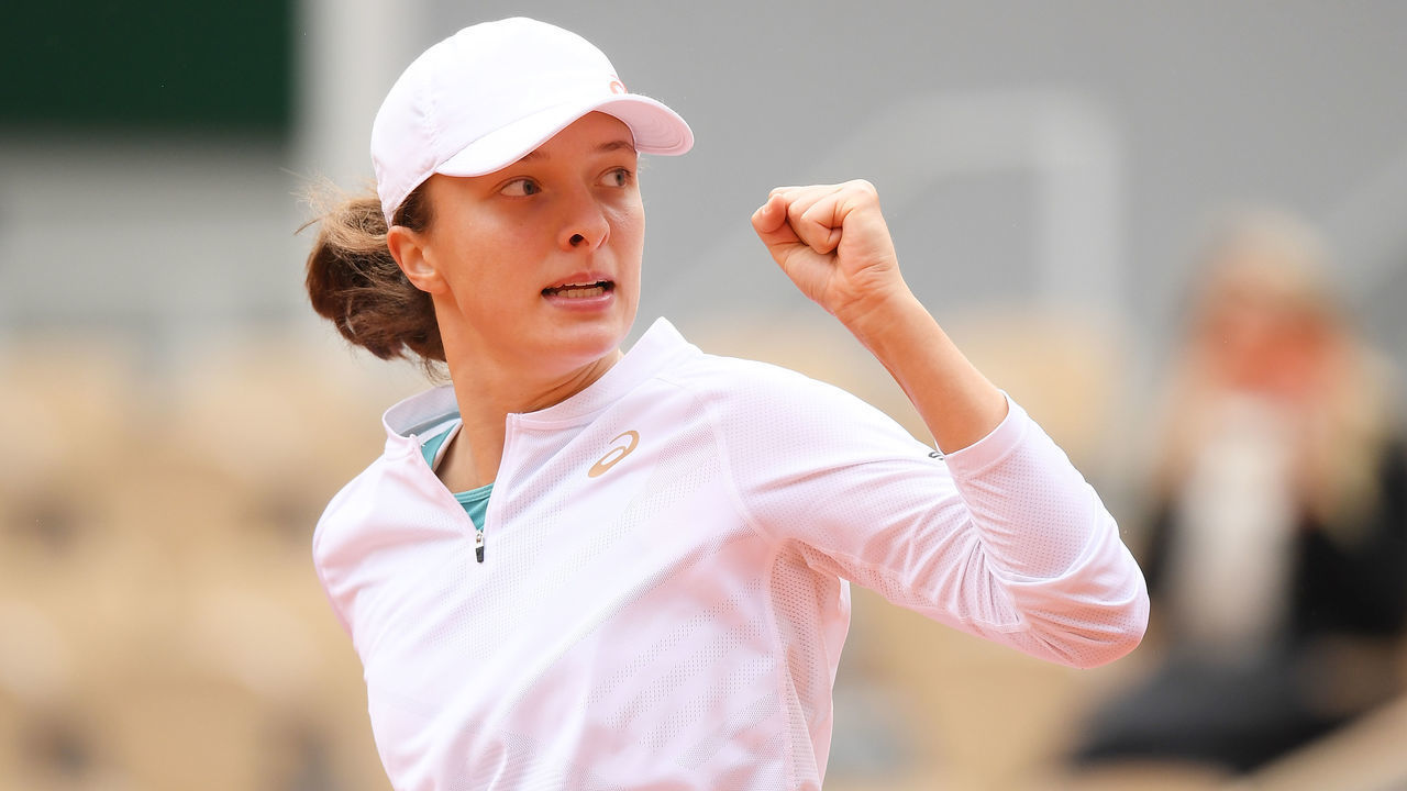 PARIS, FRANCE - OCTOBER 08: Iga Swiatek of Poland celebrates after winning the first set during her Women's Singles semifinals match against Nadia Podoroska of Argentina on day twelve of the 2020 French Open at Roland Garros on October 08, 2020 in Paris, France.