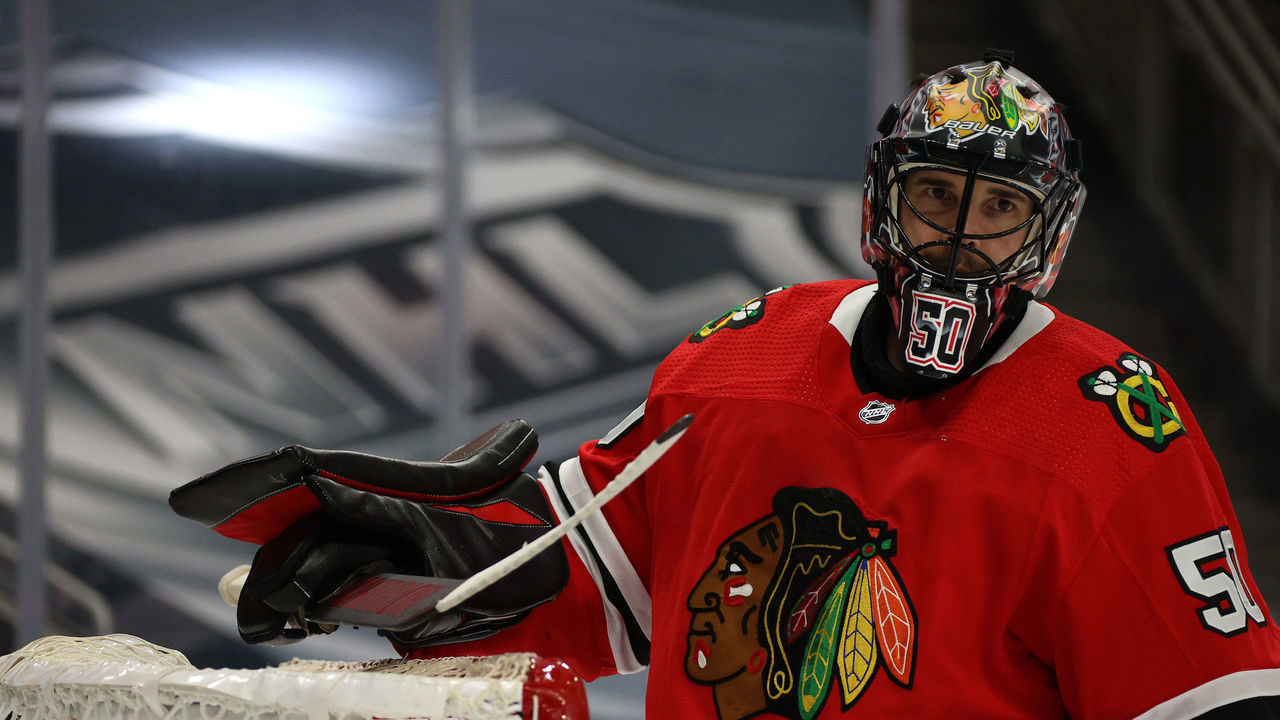EDMONTON, ALBERTA - AUGUST 07: Goaltender Corey Crawford #50 of the Chicago Blackhawks looks on in the first period of Game Four of the Western Conference Qualification Round against the Edmonton Oilers at Rogers Place on August 07, 2020 in Edmonton, Alberta.