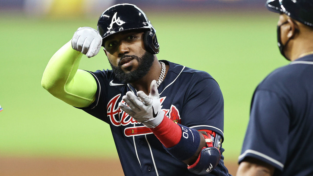 HOUSTON, TEXAS - OCTOBER 08: Marcell Ozuna #20 of the Atlanta Braves celebrates his single during the sixth inning against the Miami Marlins in Game Three of the National League Division Series at Minute Maid Park on October 08, 2020 in Houston, Texas.