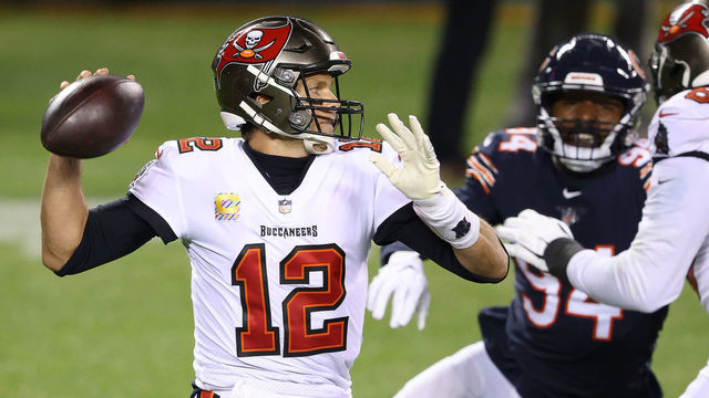 CHICAGO, IL - OCTOBER 08: Tampa Bay Buccaneers Quarterback Tom Brady (12) throws the football in game action during a NFL game between the Chicago Bears and the Tampa Bay Buccaneers on October 8th, 2020, at Soldier Field in Chicago, IL.
