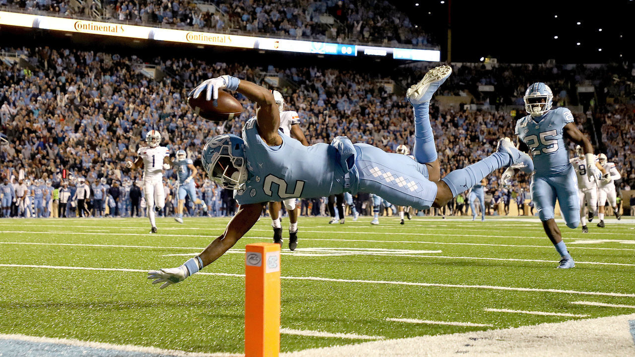 CHAPEL HILL, NC - NOVEMBER 02: Dyami Brown #2 of the University of North Carolina dives into the end zone for his first touchdown during a game between University of Virginia and University of North Carolina at Kenan Memorial Stadium on November 02, 2019 in Chapel Hill, North Carolina.