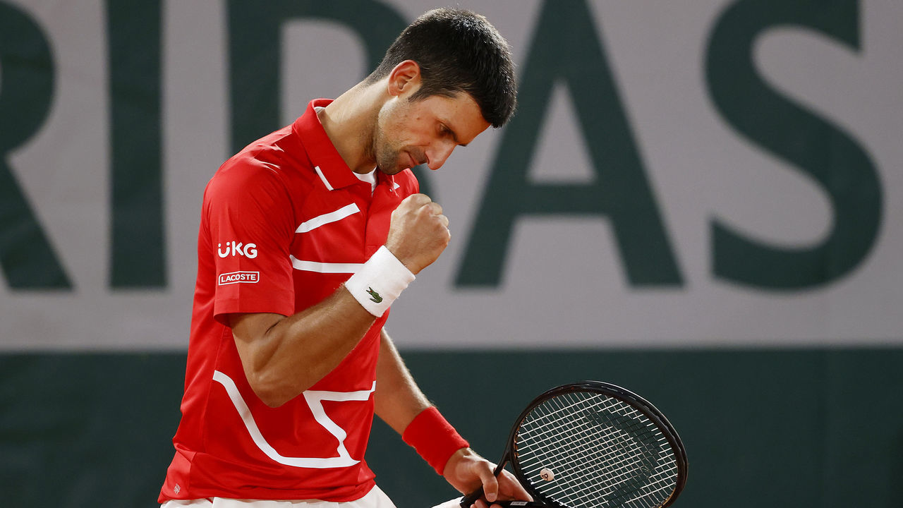 PARIS, FRANCE - OCTOBER 09: Novak Djokovic of Serbia celebrates after winning a point during his Men's Singles semifinals match against Stefanos Tsitsipas of Greece on day thirteen of the 2020 French Open at Roland Garros on October 09, 2020 in Paris, France.