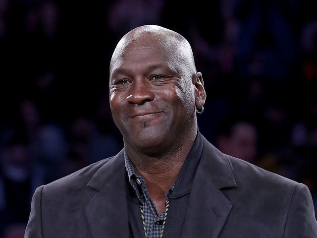 CHARLOTTE, NORTH CAROLINA - FEBRUARY 17: Michael Jordan, owner of the Charlotte Hornets, takes part in a ceremony honoring the 2020 NBA All-Star game during a break in play as Team LeBron take on Team Giannis in the fourth quarter during the NBA All-Star game as part of the 2019 NBA All-Star Weekend at Spectrum Center on February 17, 2019 in Charlotte, North Carolina. Team LeBron won 178-164. NOTE TO USER: User expressly acknowledges and agrees that, by downloading and/or using this photograph, user is consenting to the terms and conditions of the Getty Images License Agreement.