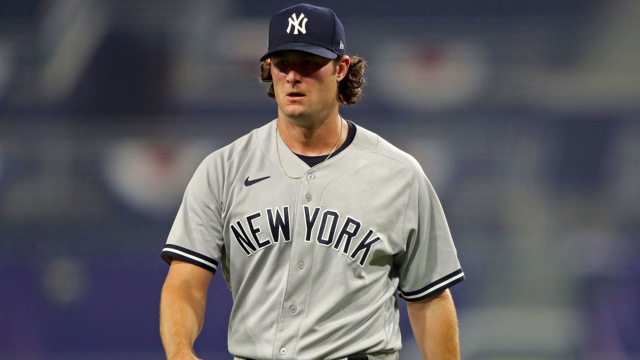 SAN DIEGO, CA - OCTOBER 05: Gerrit Cole #45 of the New York Yankees walks back to the dugout during Game 1 of the ALDS between the New York Yankees and the Tampa Bay Rays at Petco Park on Monday, October 5, 2020 in San Diego, California.