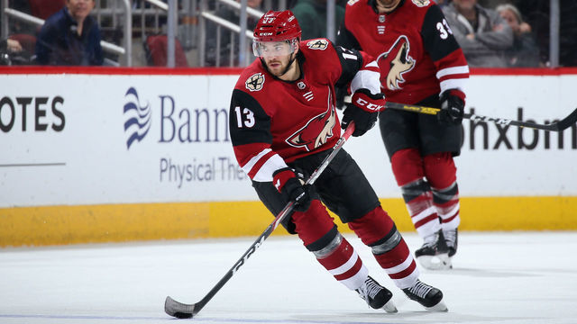 GLENDALE, ARIZONA - FEBRUARY 17: Vinnie Hinostroza #13 of the Arizona Coyotes skates with the puck during the third period of the NHL game against the New York Islanders at Gila River Arena on February 17, 2020 in Glendale, Arizona. The Coyotes defeated the Islanders 2-1.