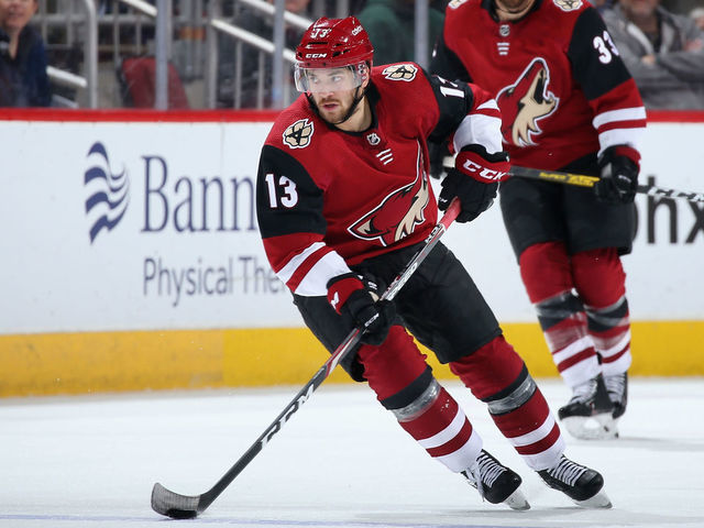 GLENDALE, ARIZONA - FEBRUARY 17: Vinnie Hinostroza #13 of the Arizona Coyotes skates with the puck during the third period of the NHL game against the New York Islanders at Gila River Arena on February 17, 2020 in Glendale, Arizona. The Coyotes defeated the Islanders 2-1.