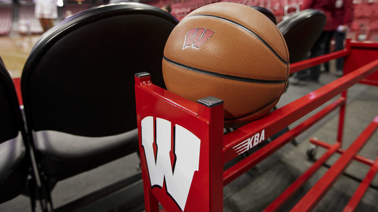 MADISON, WI - FEBRUARY 19: A basketball with the Motion W logo sits on the basketball rack durning warms ups prior to an college basketball game between the Maryland Terrapins and the Wisconsin Badgers at the Kohl Center in Madison, WI on February 19th, 2017. Wisconsin defeats Maryland 71-60.