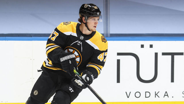 TORONTO, ONTARIO - AUGUST 02: Torey Krug #47 of the Boston Bruins plays the puck against the Philadelphia Flyers during the first period in a Round Robin game during the 2020 NHL Stanley Cup Playoff at Scotiabank Arena on August 02, 2020 in Toronto, Ontario.
