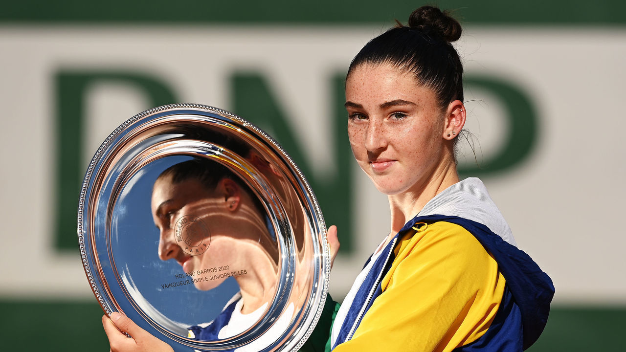 PARIS, FRANCE - OCTOBER 10: Elsa Jacquemot of France poses with the winners trophy following her Girls' Singles Final victory against Alina Charaeva of Russia on day fourteen of the 2020 French Open at Roland Garros on October 10, 2020 in Paris, France.