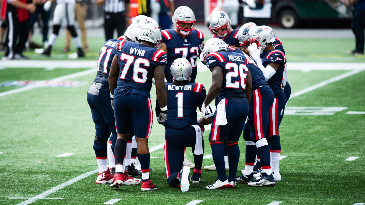 FOXBOROUGH, MA - SEPTEMBER 27: Cam Newton #1 of the New England Patriots in an offensive huddle in the first half against the Las Vegas Raiders at Gillette Stadium on September 27, 2020 in Foxborough, Massachusetts.