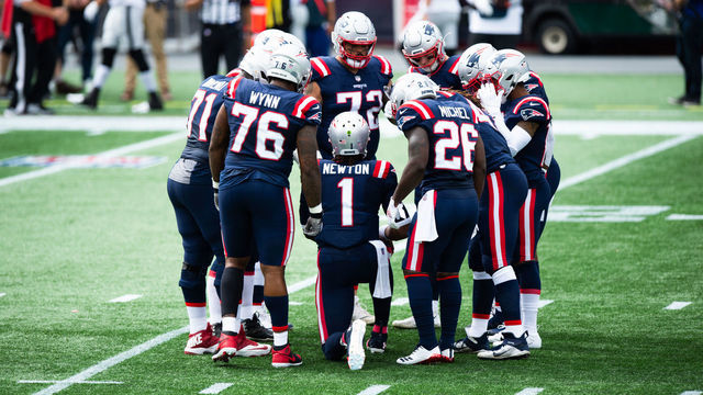 FOXBOROUGH, MA - SEPTEMBER 27: Cam Newton #1 of the New England Patriots in an offensive huddle in the first half against the Las Vegas Raiders at Gillette Stadium on September 27, 2020 in Foxborough, Massachusetts.