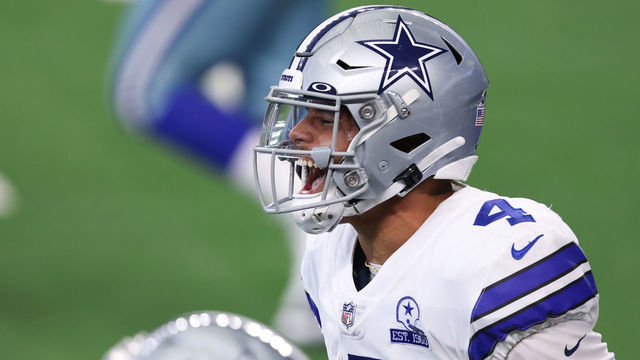 ARLINGTON, TEXAS - OCTOBER 11: Dak Prescott #4 of the Dallas Cowboys celebrates his touchdown reception against the New York Giants during the second quarter at AT&T Stadium on October 11, 2020 in Arlington, Texas.