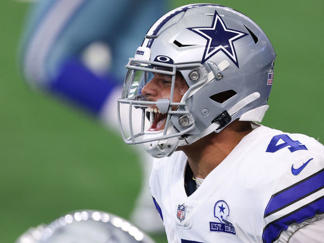ARLINGTON, TEXAS - OCTOBER 11: Dak Prescott #4 of the Dallas Cowboys celebrates his touchdown reception against the New York Giants during the second quarter at AT&T Stadium on October 11, 2020 in Arlington, Texas.