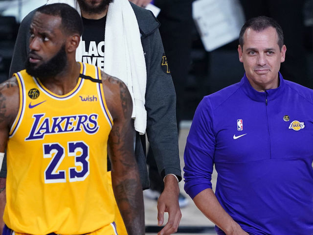 LAKE BUENA VISTA, FLORIDA - AUGUST 18: Head coach Frank Vogel and LeBron James #23 of the Los Angeles Lakers walk on the court during a timeout due to a goal being knocked out of position during action against the Portland Trail Blazers in the first half in Game 1 of Round 1 of the NBA Playoffs at AdventHealth Arena at ESPN Wide World Of Sports Complex on August 18, 2020 in Lake Buena Vista, Florida.