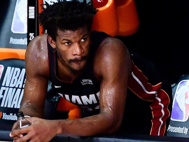 LAKE BUENA VISTA, FLORIDA - OCTOBER 11: Jimmy Butler #22 of the Miami Heat and the Miami Heat bench react during the fourth quarter against the Los Angeles Lakers in Game Six of the 2020 NBA Finals at AdventHealth Arena at the ESPN Wide World Of Sports Complex on October 11, 2020 in Lake Buena Vista, Florida.