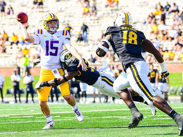 COLUMBIA, MO - OCTOBER 10: Myles Brennan #15 of the LSU Tigers makes a pass against the Missouri Tigers on October 10, 2020 at Memorial Stadium in Columbia, Missouri.