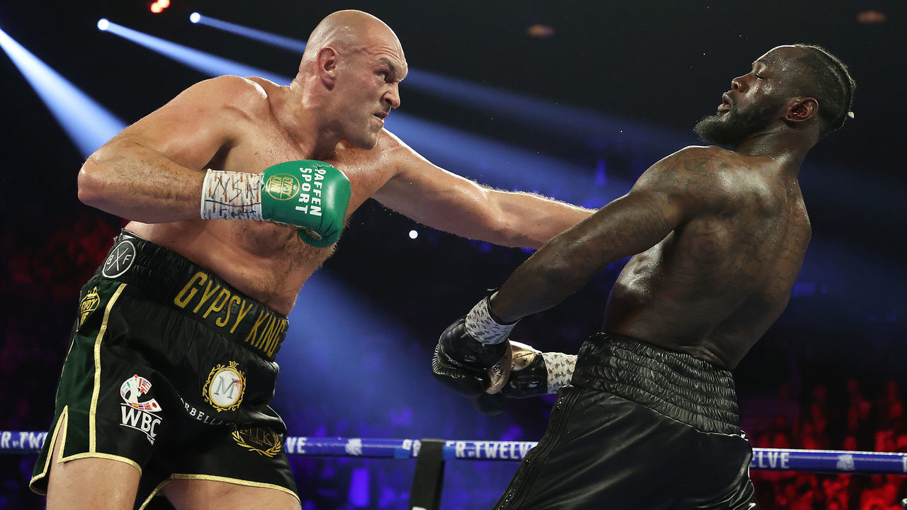LAS VEGAS, NEVADA - FEBRUARY 22: Tyson Fury punches Deontay Wilder during their Heavyweight bout for Wilder's WBC and Fury's lineal heavyweight title on February 22, 2020 at MGM Grand Garden Arena in Las Vegas, Nevada.