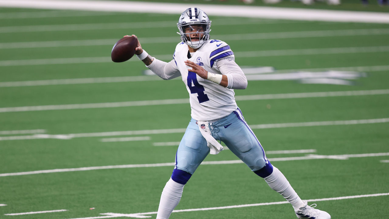 ARLINGTON, TEXAS - OCTOBER 11: Dak Prescott #4 of the Dallas Cowboys attempts a pass against the New York Giants during the second quarter at AT&T Stadium on October 11, 2020 in Arlington, Texas.