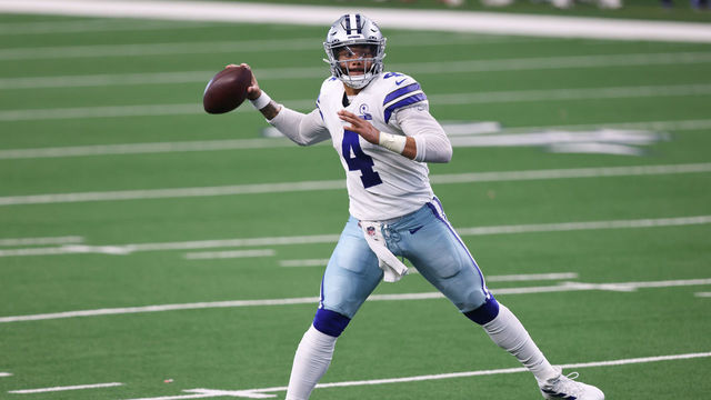 ARLINGTON, TEXAS - OCTOBER 11: Dak Prescott #4 of the Dallas Cowboys attempts a pass against the New York Giants during the second quarter at AT&T Stadium on October 11, 2020 in Arlington, Texas.