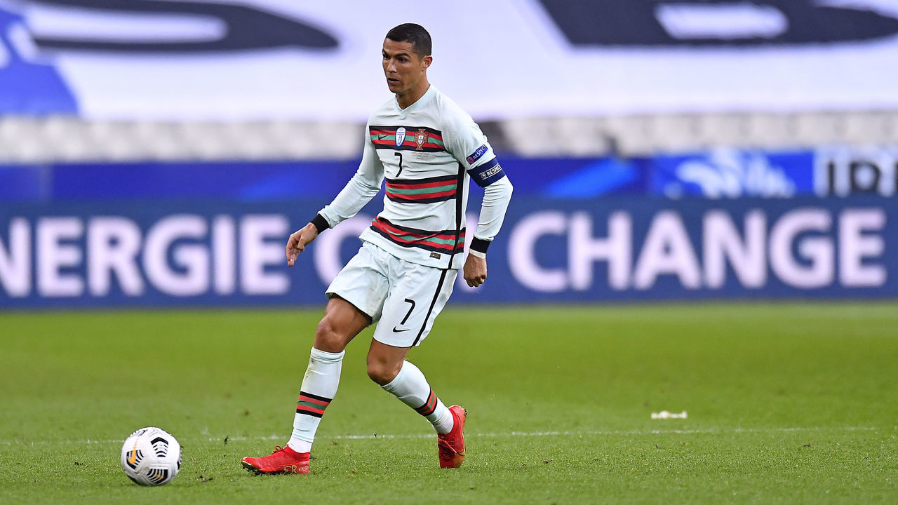 PARIS, FRANCE - OCTOBER 11: Cristiano Ronaldo of Portugal runs with the ball during the UEFA Nations League group stage match between France and Portugal at Stade de France on October 11, 2020 in Paris, France.